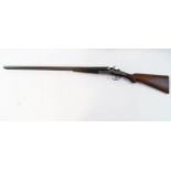 A T Wild 12 gauge back action hammer Shotgun,