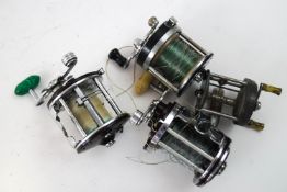 A collection of American multiplier reels, Penn (2),