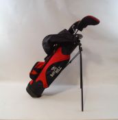 A Bay Hill golf bag with clubs