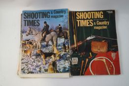 A large quantity of Shooting Times and Country magazines, together with copies of The Field,
