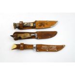 Three hunting knives,