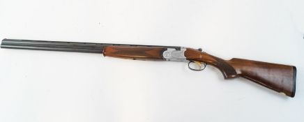 A Beretta 20 bore Shotgun together with chokes, 29 1/2" barrels, 3" chambers,