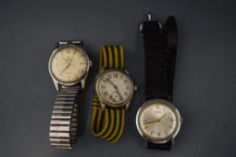 A collection of three gentlemens' vintage mechanical wrist watches, Cyma,