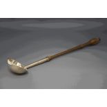 A George II silver punch ladle, makers mark GD in script, London 1740,