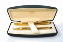A Cross rolled gold fountain pen with 14K gold nib, and matching ballpoint pen,