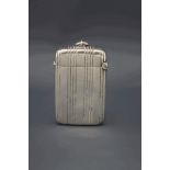 A late Victorian silver vesta case, Birmingham 1894, with reeded decoration,