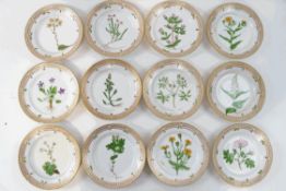 A set of twelve Royal Copenhagen Flora Danica dessert plates,
