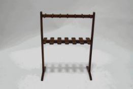 A late 19th/early 20th century oak shooting stick stand,