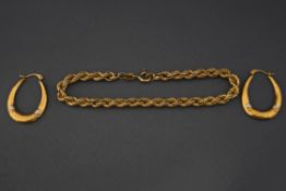 A 9 carat gold bracelet, of hollow rope links; and a pair of hoop earrings, stamped '375'; 3.