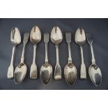 A collection of eight antique silver fiddle pattern teaspoons, various makers and dates,