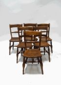 A harlequin set of six Country elm and beech kitchen chairs