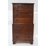 A mahogany table top chest of eight graduated drawers,