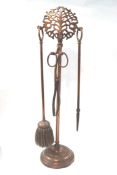 An arts and craft style copper fire compendium,