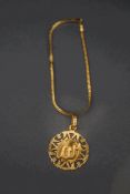 A continental pendant, stamped '750', 2.6 g gross; with a 9 carat gold bracelet of flat links, 1.