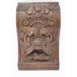 An oak architectural mount, carved as a Green Man and with Prince of Wales feathers,