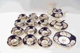 A 19th century Gaudy Welsh tea service, comprising a teapot, milk jug, thirteen cups,