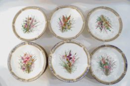 A 19th century Worcester porcelain dessert service painted in enamels with bouquets of wild flowers,