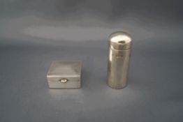 A silver cylindrical box, London 1972, with a pull off cover, 4.