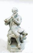 An 18th century pearlware figure of a gentleman sitting on a chair playing the flute,