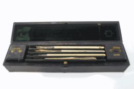 A 19th century green leather cased writing set, containing four ivory handled implements, by S.