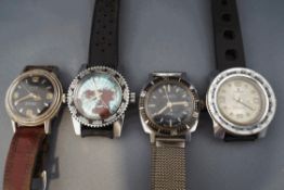 A collection of four vintage gentleman's wrist watches,