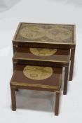 A set of three modern mahogany and brass mounted coffee tables, with inset reproduction maps,