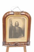 A Victorian print of Jesus Christ, within a rosewood frame,