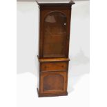 A Victorian mahogany glazed bookcase, with four shelves, above a single drawer and cupboard,