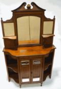 A 19th century rosewood mirror back chiffonier, with partially mirrored cupboard flanked by shelves,