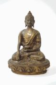 An Asian bronze figure of a buddha,