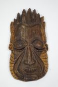 An East African carved tribal head from the Shangana tribe,