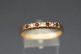 A carat gold ruby and diamond half hoop eternity ring, finger size W, 2.
