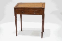 A late Victorian oak desk with fall front and single drawer