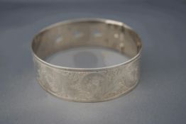 A silver Charles Horner expanding bangle, Chester 1945,