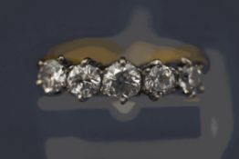 A five stone diamond ring, stamped '18ct',