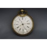 An open faced pocket watch with stop watch action, the white enamel dial with black Roman numerals,