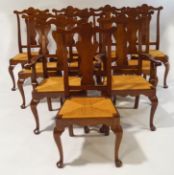 A set of ten American cherrywood dining chairs with rush seats