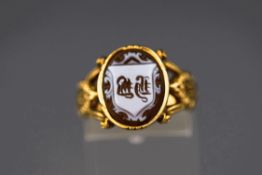 A late Victorian sardonyx seal ring, monogrammed, unmarked, finger size O,