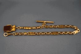 A late Victorian fancy pierced link watch chain, tagged '9ct'.