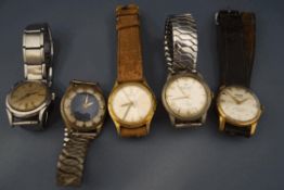 A collection of five vintage gentlemen's mechanical wrist watches