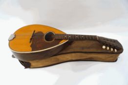 A Chinese made mandolin, with inlaid decoration,