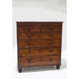 A Victorian mahogany chest of two short and four long drawers, upon turned feet,