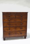 A Victorian mahogany chest of two short and four long drawers, upon turned feet,