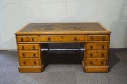 A Victorian oak pedestal partners desk,