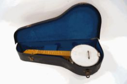 A Ukulele four string banjo,