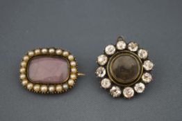 A Victorian mourning brooch, the central circular hair locket enclosed by colourless pastes,