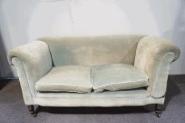 A Victorian two seater drop end sofa,