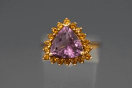 A 9 carat gold amethyst and citrine cluster ring, finger size N, 3.