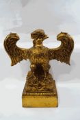 A modern gilded table base, modelled as an eagle with outstretched wings,