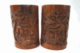 A pair of carved bamboo brush washes,